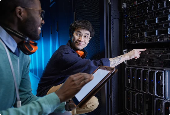 Technicians in server room